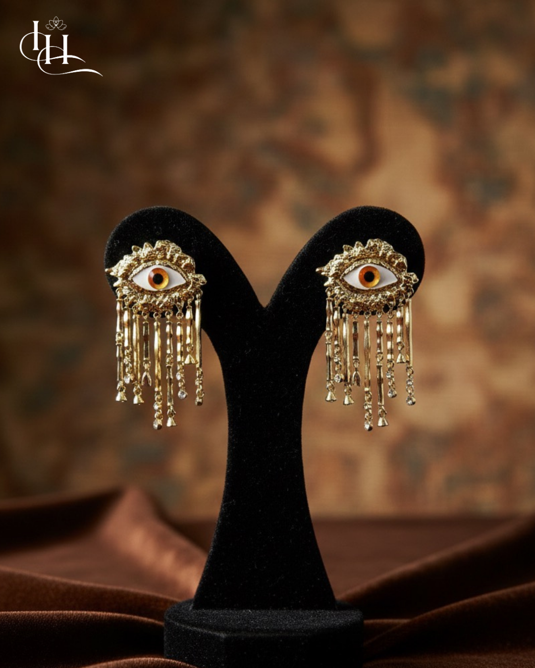 “Eye Elegance Statement Anti-Tarnish Earrings – Gold Dangle Designer Edition”