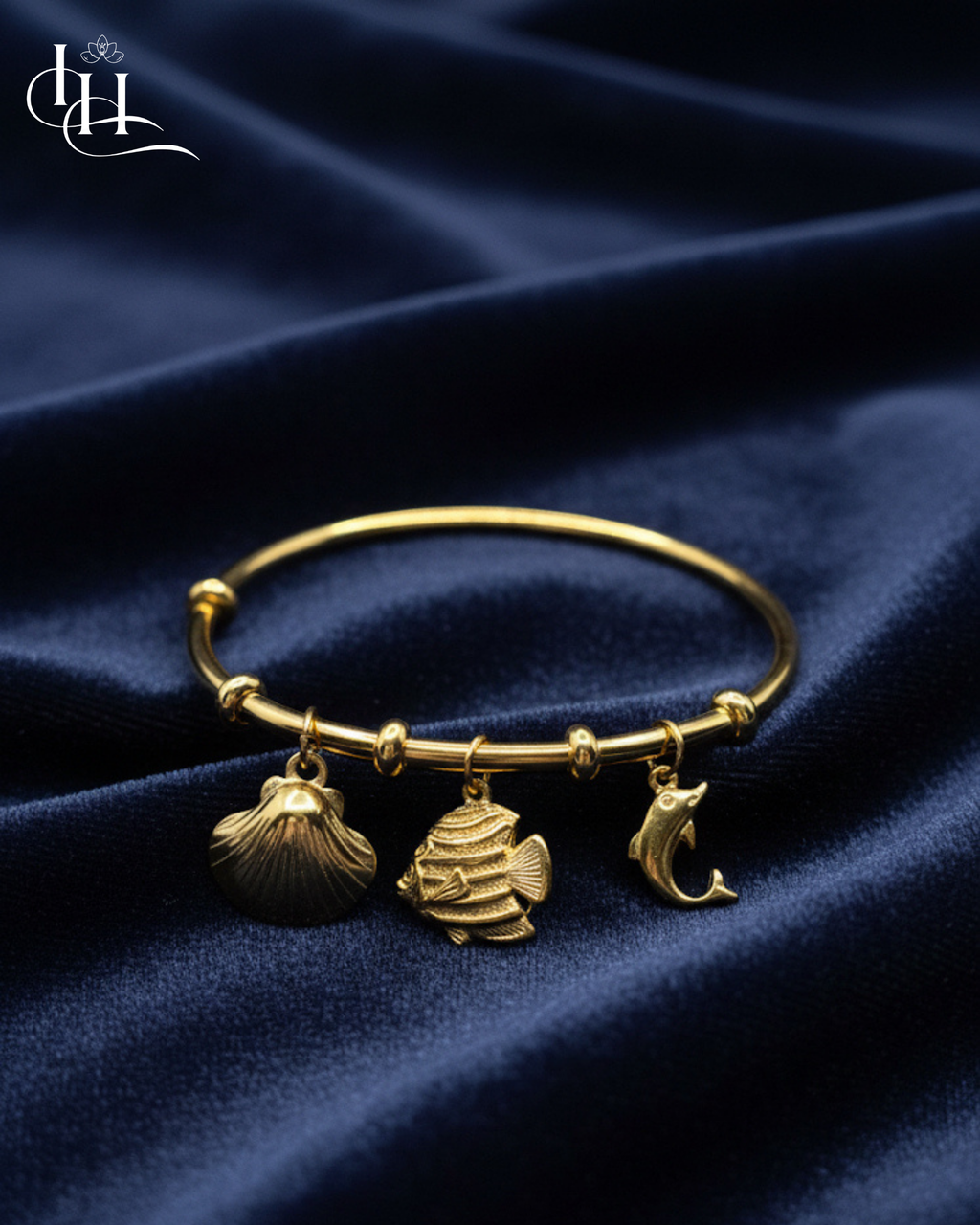 Ocean Charm Gold Bangle with Sea-Inspired Pendants