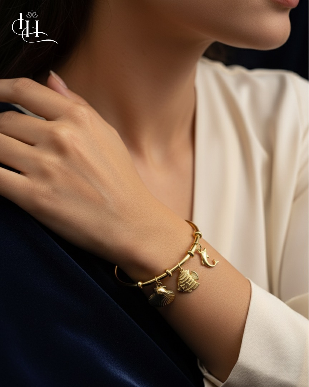 Ocean Charm Gold Bangle with Sea-Inspired Pendants